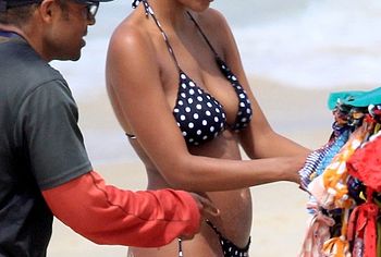 tina kunakey topless beach photo