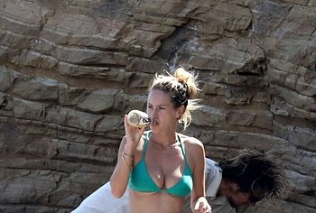 Dylan Penn topless beach photos