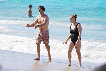 Amy Schumer sunbathing