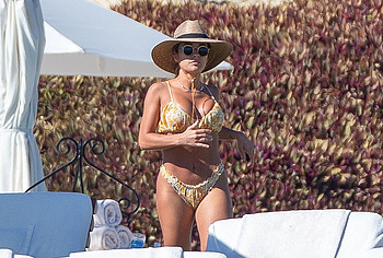 Jessie James Decker sunbathing