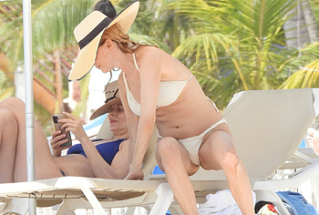 Heather Graham nude beach photos