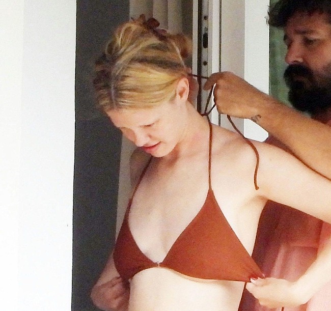 Mia Goth bikini photos