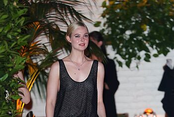 Elle Fanning in transparent dress